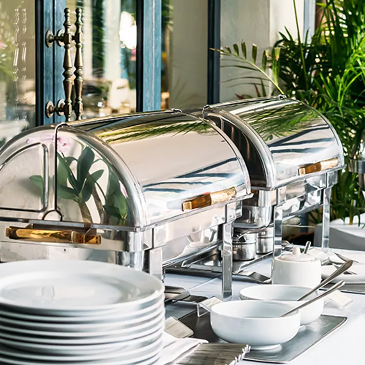 A catering buffet line with chafing dishes