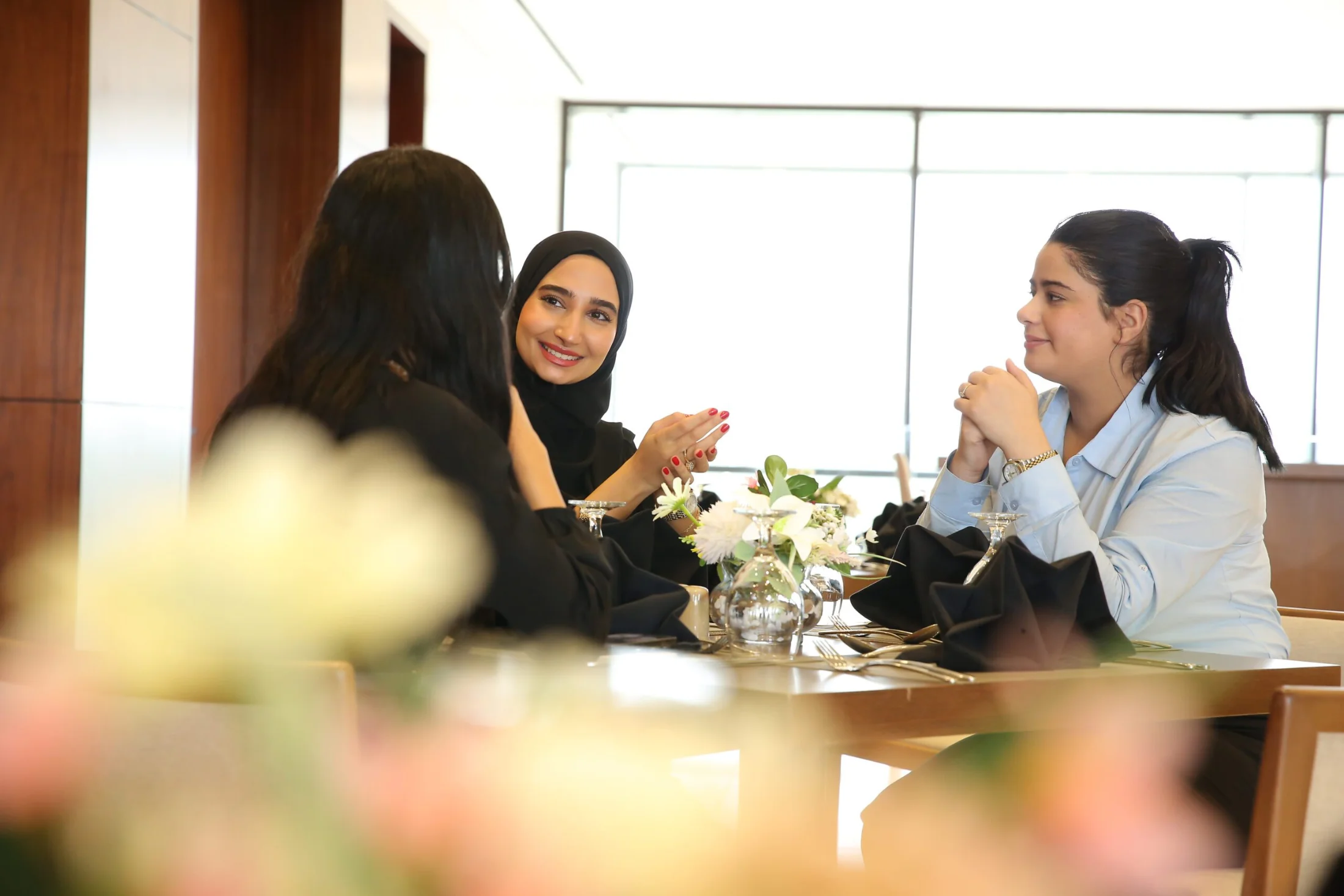 Guests sharing a meal at Coffeista