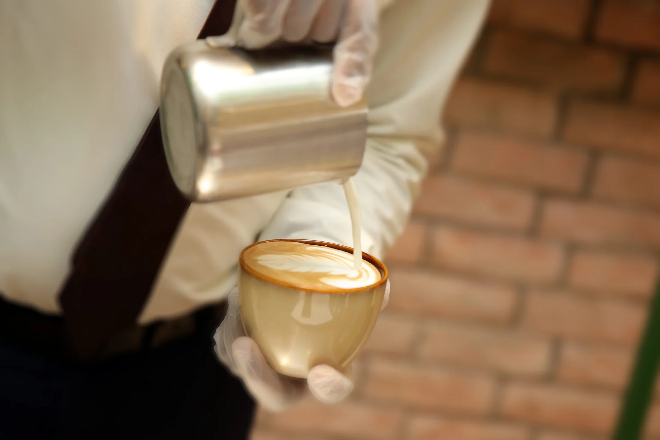 Latte art poured by a Coffeista barista